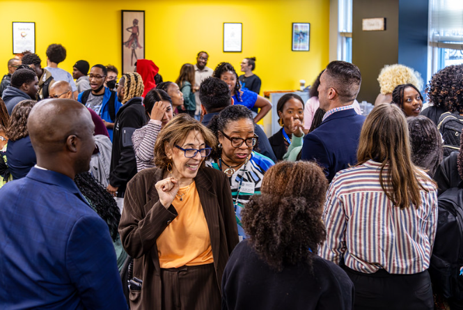 Different conversations taking place in the Sankofa Lounge