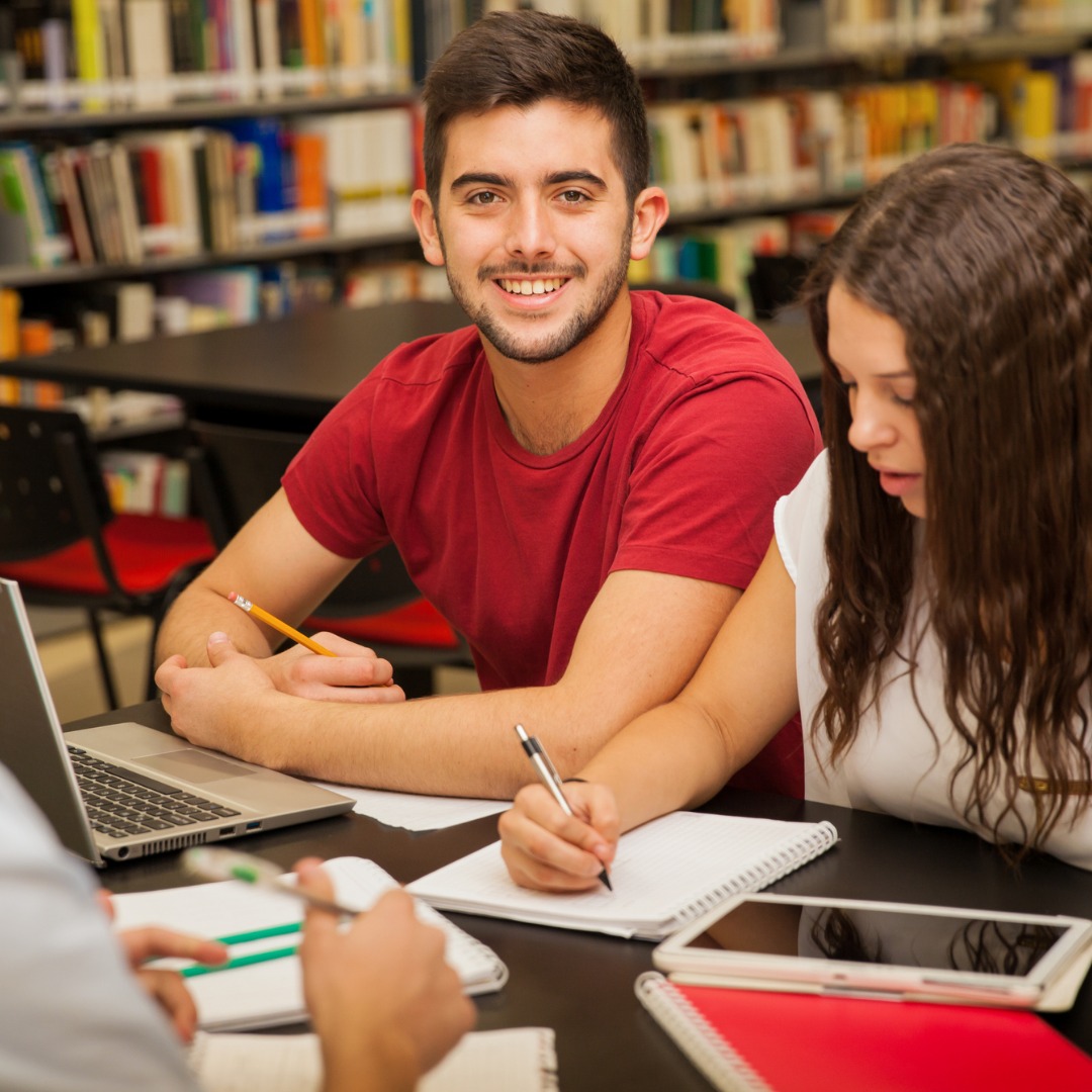 students working in the library